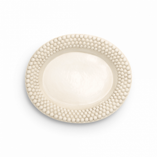 Oval tallrik från Mateus kollektion i färgen sand.